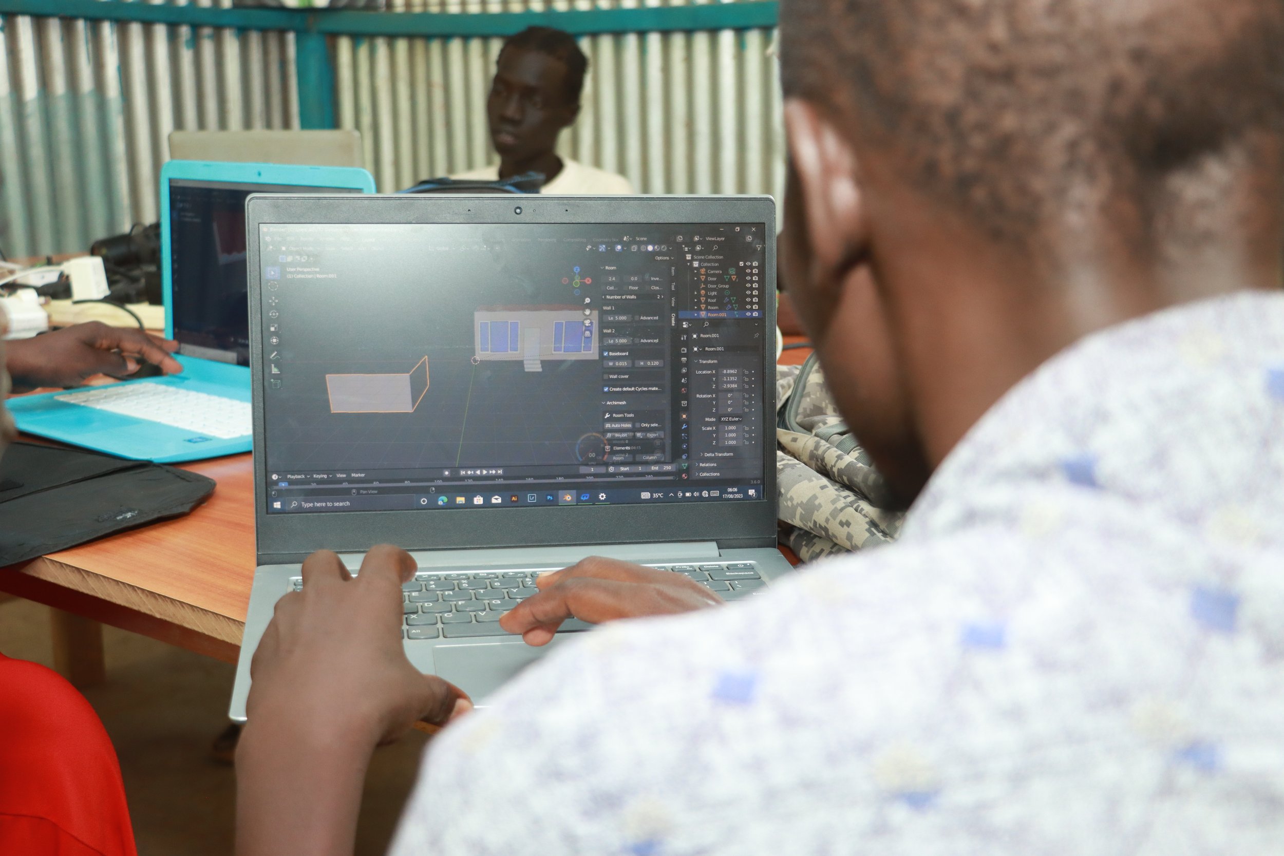a young man in Kakuma refugee camp learning 3d modelling in the creative Gateway  Program by Ambitious Africa